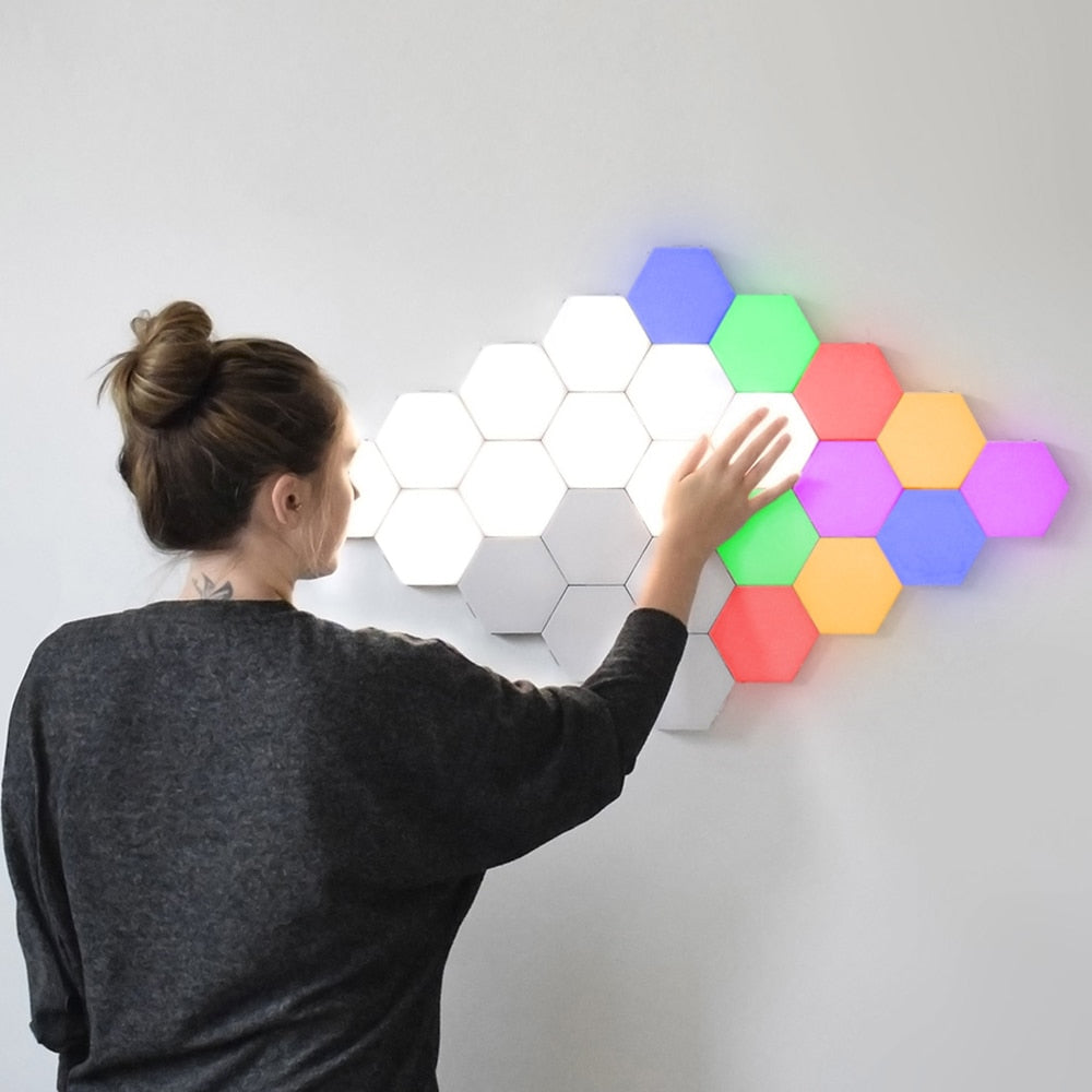 Larger image of lights arranged as diamond on wall with multi colors woman waving hand