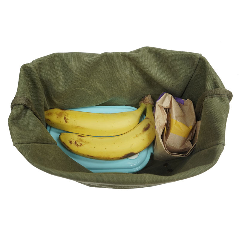 open bag with two bananas a tuppeware container and a bulgy rolled take away paper bag insideWaxed Canvas Leather Lunch Bag